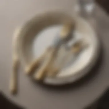 Artistic Arrangement of Gilded Cutlery Gilded cutlery set arranged artistically on a silk tablecloth