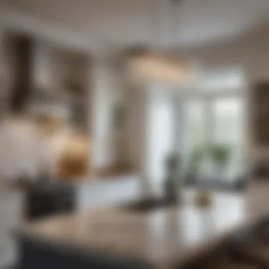 Elegant crystal chandelier hanging above a modern small kitchen island