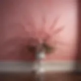 Elegant pink wall painting design with floral motif