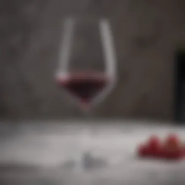 Elegant Red Wine Glass on Marble Table Elegant Red Wine Glass on Marble Table