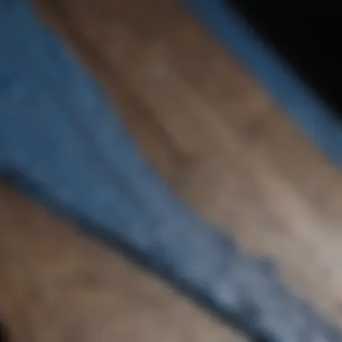 Close-up of Textured Blue Paint on a Wooden Surface Close-up of textured blue paint on a wooden surface