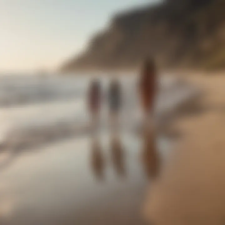 Mother and daughter walking hand in hand on a sandy beach