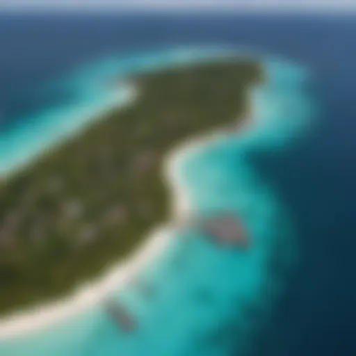 Aerial view of a pristine Maldivian island surrounded by turquoise waters.