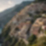 Aerial view of Positano's colorful buildings cascading down cliffs