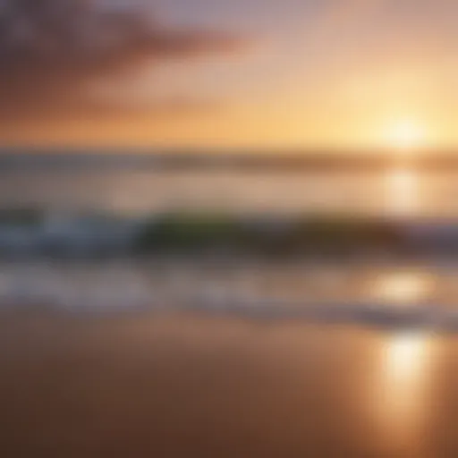 Serene beach with soft waves and a vibrant sunset