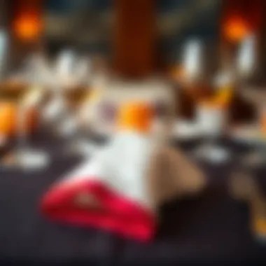 Artful Presentation: A Folded Cocktail Napkin Close-up of a beautifully folded cocktail napkin on a stylish table setting