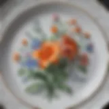 A close-up view of a Herend china plate showcasing intricate floral designs
