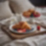 Elegant breakfast tray with croissant and fresh berries