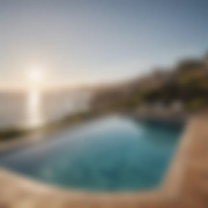 Serene outdoor pool area overlooking the coastline