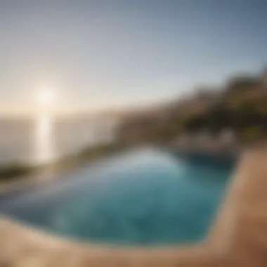Serene Outdoor Pool Area Serene outdoor pool area overlooking the coastline