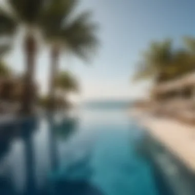 Indulge in Luxury and Comfort Luxurious resort pool with elegant loungers under a clear blue sky.