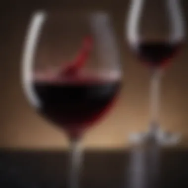 Close-up of wine glass showcasing a deep red varietal