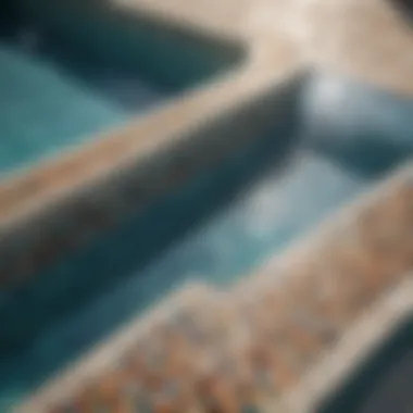 Close-up of a sparkling mosaic tile swimming pool