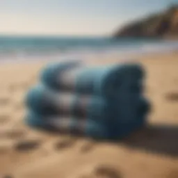 Luxurious beach towels displayed on a sandy shore