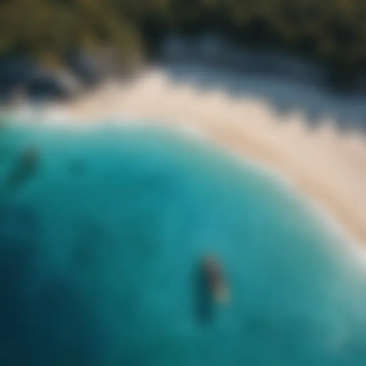 Stunning aerial view of a pristine beach with crystal clear waters